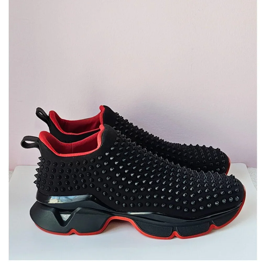 Christian Louboutin Spike Sock Sneakers.